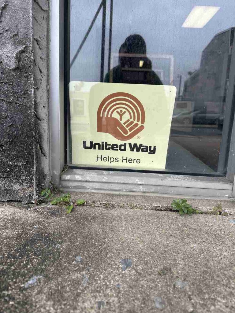 sign - United Way Helps Here