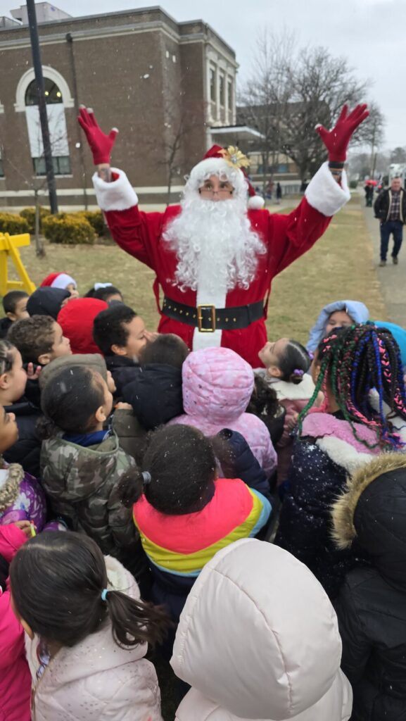 Santa with children at Roosevelt Elementary School in Allentown