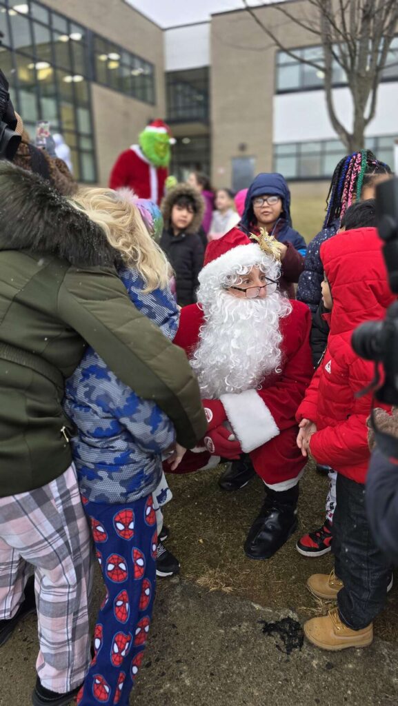 Santa with children at Roosevelt Elementary School in Allentown