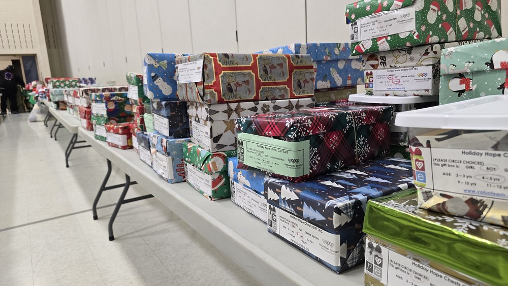 Presents on a table at Roosevelt Elementary School for the 2024 TeenWorks Toy Drive