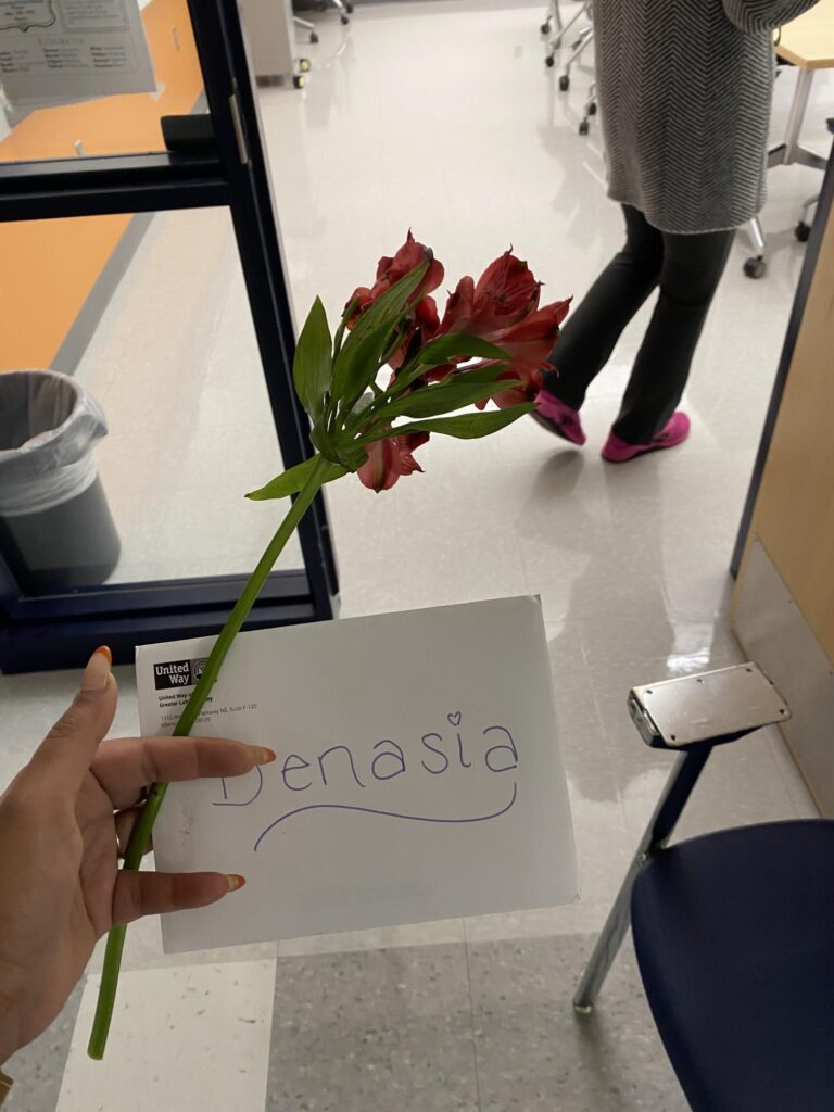 Flowers and a card for Denasia, Community School Coordinator at Brigadier General Anna Mae Hays Elementary School in the Allentown School District