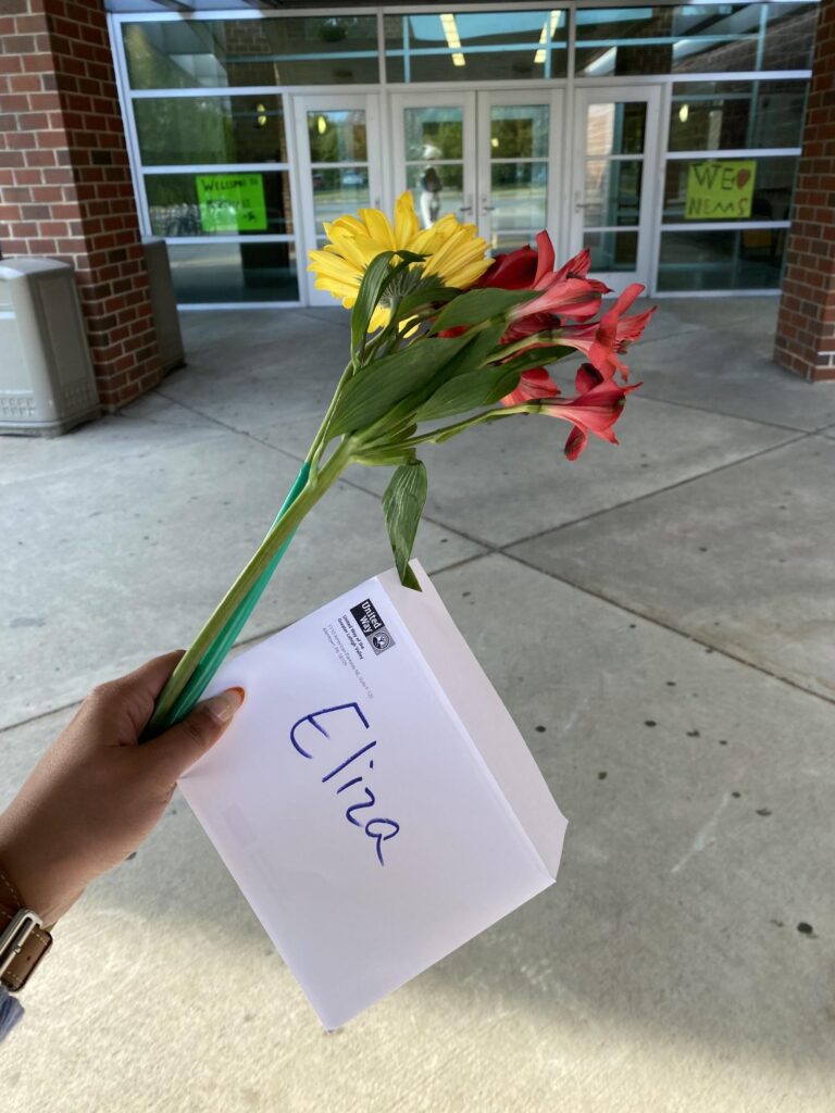 Flowers and a card for Eliza, Community School Coordinator at Northeast Middle School in the Bethlehem Area School District