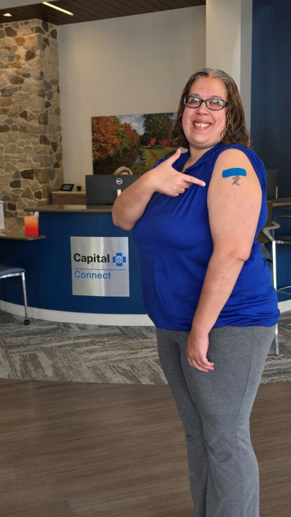 United Way's Jen Nicolosi at Capital Blue for her flu shot