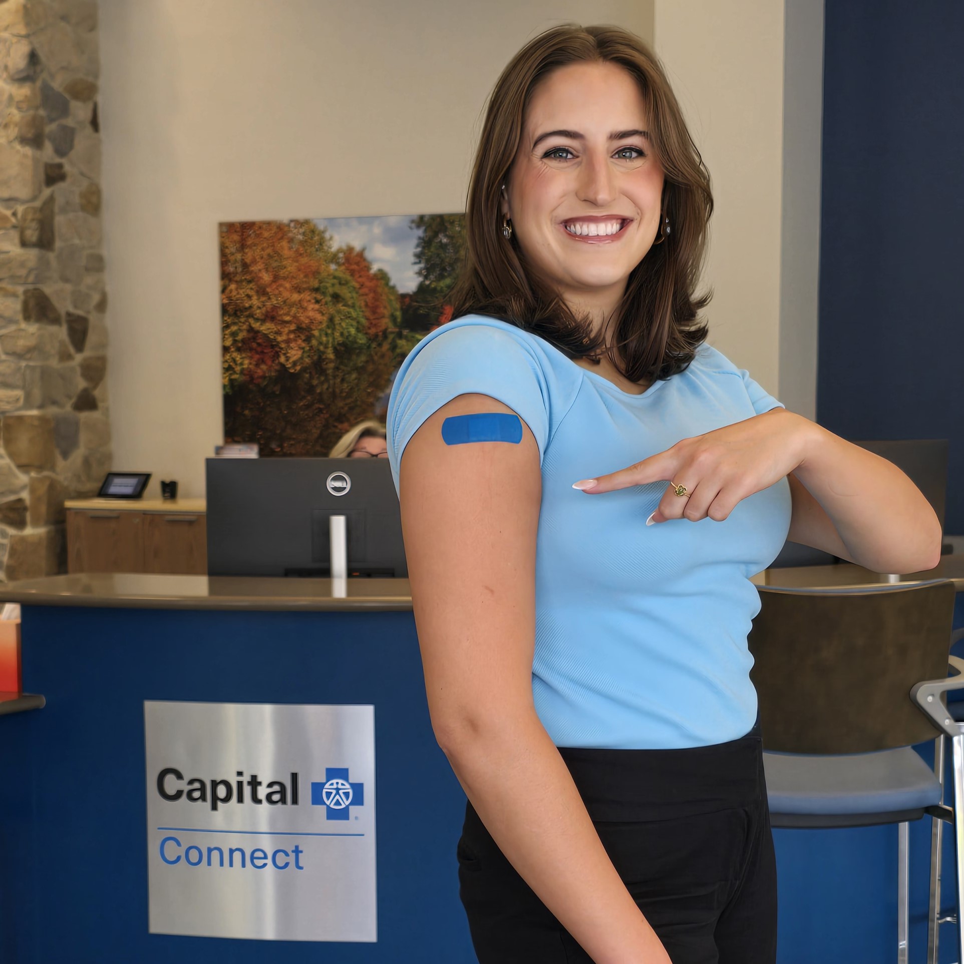 United Way's Maggie Walters at Capital Blue for her flu shot